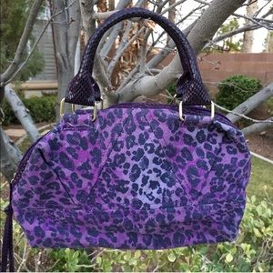 Small purple leopard spotted purse